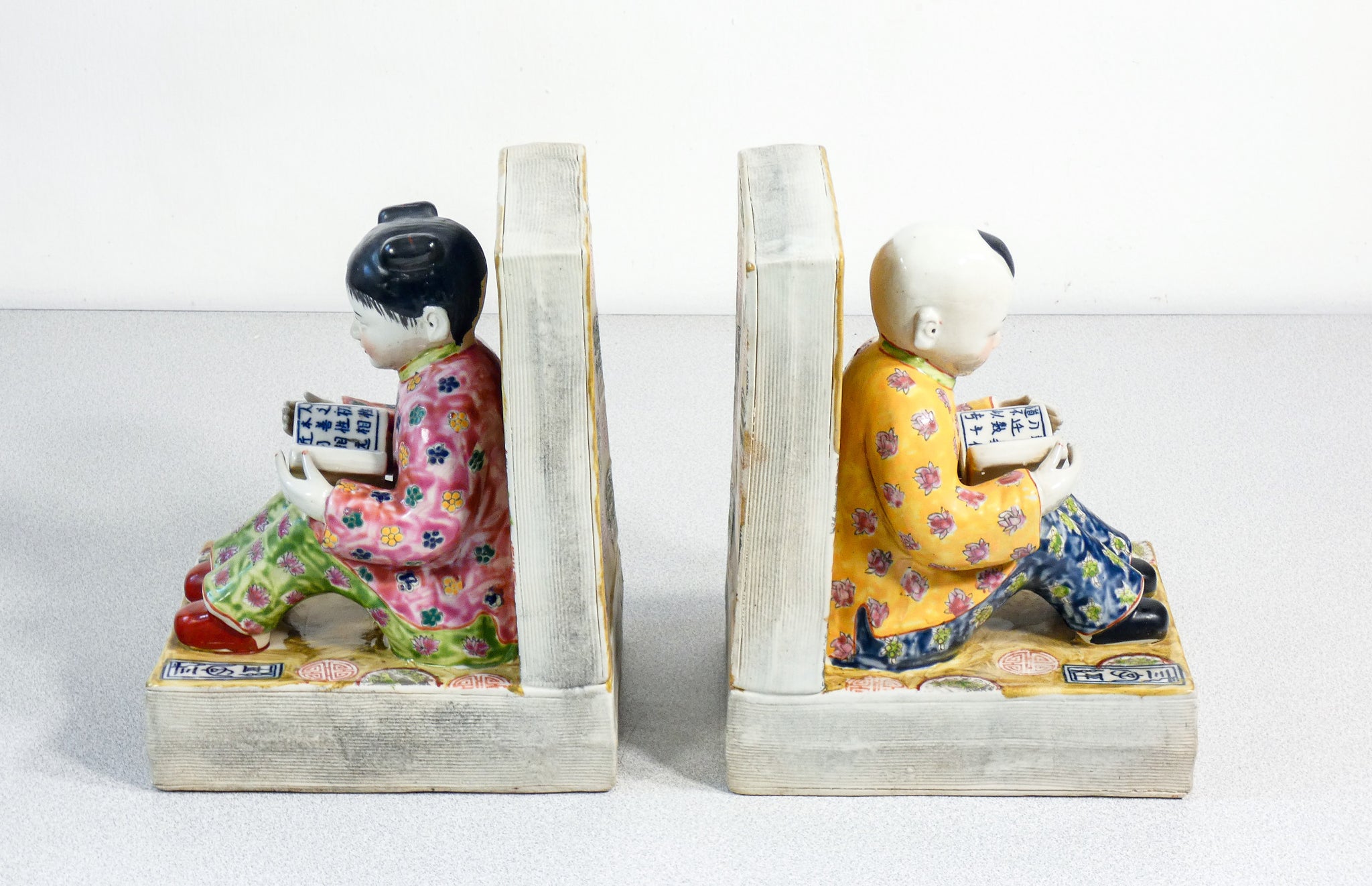 coppia fermalibri sculture porcellana dipinta a mano cina uomo donna lettori